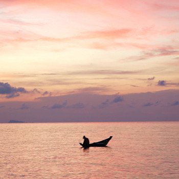 Fisherman in small boat